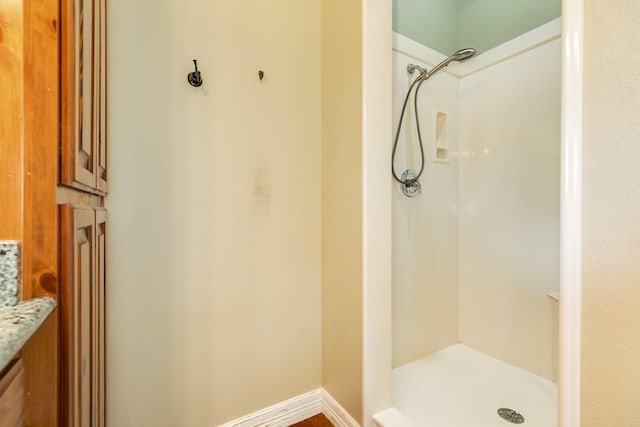 full bathroom with a stall shower
