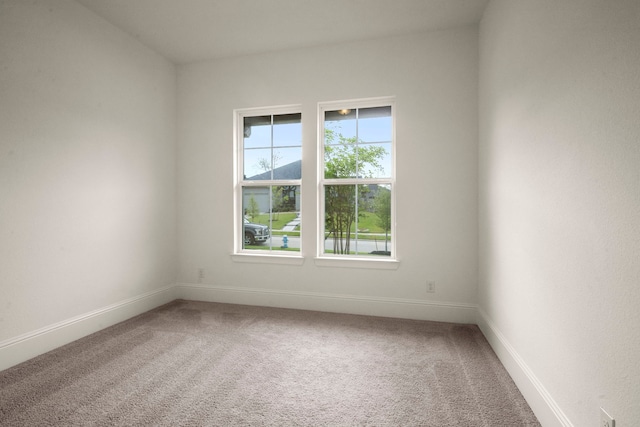 1222 Tallow Park Ln, Pinehurst, TX 77362 - carpeted empty room featuring baseboards
