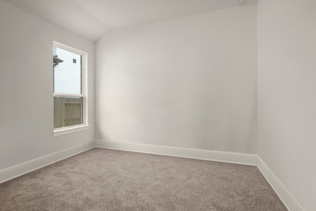 1222 Tallow Park Ln, Pinehurst, TX 77362 - carpeted spare room with lofted ceiling and baseboards