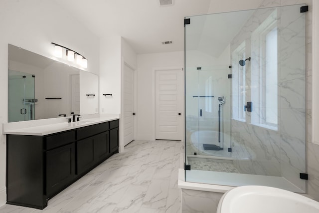 1222 Tallow Park Ln, Pinehurst, TX 77362 - bathroom with a marble finish shower, marble finish floors, vanity, and a tub to relax in