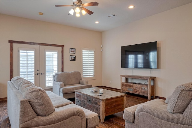 living area with recessed lighting, wood finished floors, ceiling fan, baseboards, and visible vents