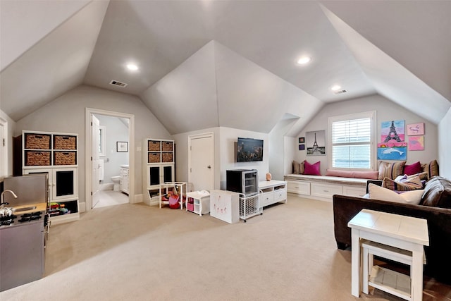 4020 Sul Ross St, Houston, TX 77027 - living room with visible vents, light carpet, and lofted ceiling