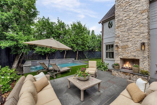 4020 Sul Ross St, Houston, TX 77027 - view of patio / terrace featuring an outdoor living space with a fireplace, a fenced backyard, and a fenced in pool