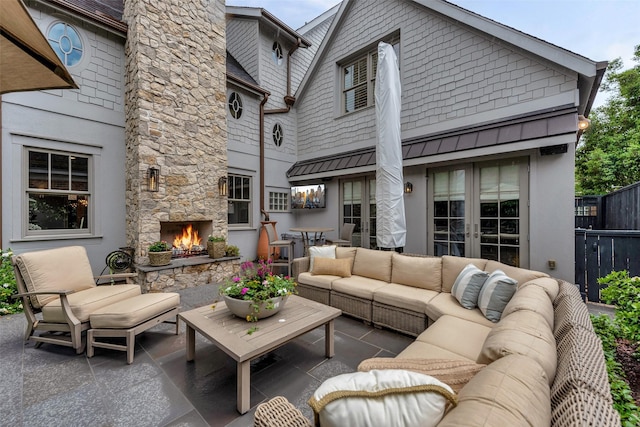 4020 Sul Ross St, Houston, TX 77027 - view of patio featuring fence, french doors, and an outdoor living space with a fireplace