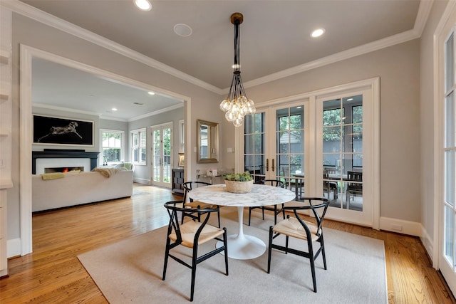 4020 Sul Ross St, Houston, TX 77027 - dining space with light wood-type flooring, recessed lighting, and a notable chandelier