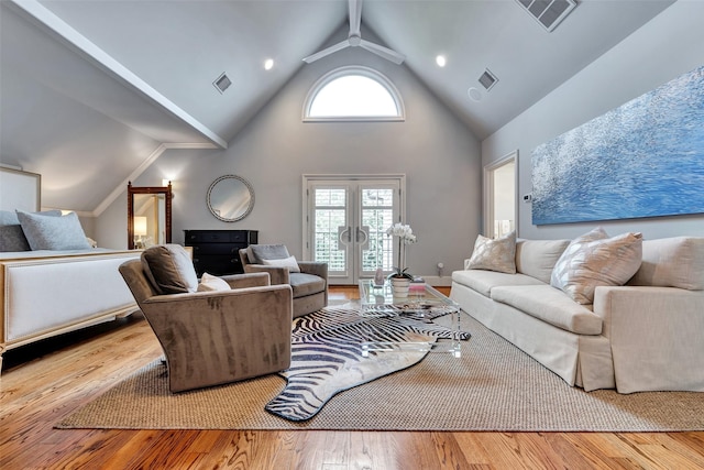 4020 Sul Ross St, Houston, TX 77027 - living area featuring hardwood / wood-style floors, visible vents, and high vaulted ceiling