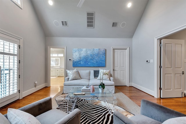 4020 Sul Ross St, Houston, TX 77027 - living room featuring baseboards, visible vents, and high vaulted ceiling