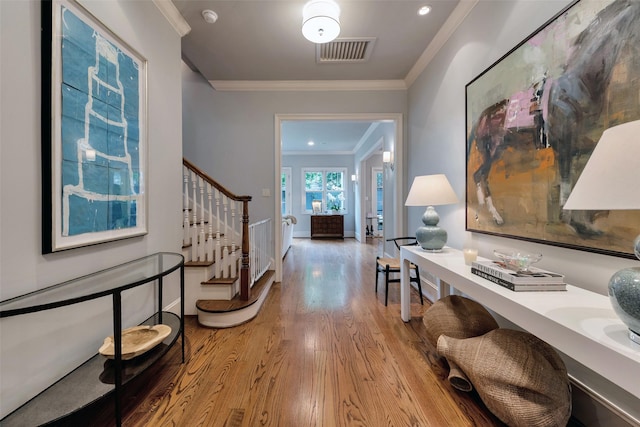 4020 Sul Ross St, Houston, TX 77027 - corridor featuring stairway, visible vents, baseboards, ornamental molding, and wood finished floors