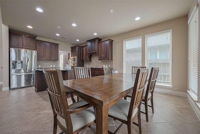 dining space with baseboards, recessed lighting, light tile patterned floors, and visible vents