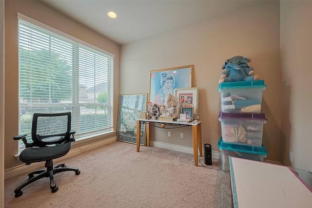 office featuring baseboards and carpet flooring