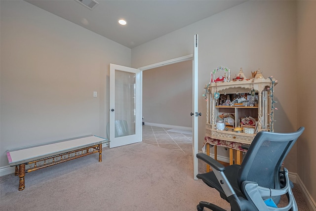 office featuring baseboards, visible vents, carpet floors, and french doors
