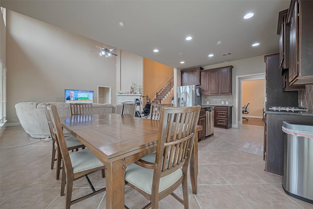 dining area with recessed lighting, stairs, light tile patterned floors, ceiling fan, and visible vents