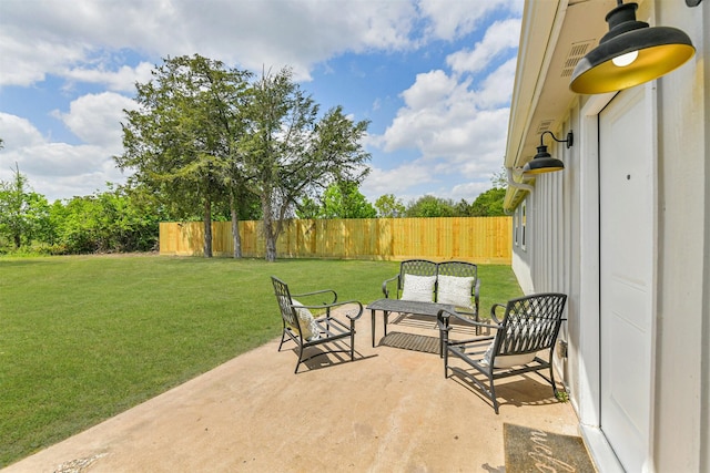 view of patio featuring fence and an outdoor living space
