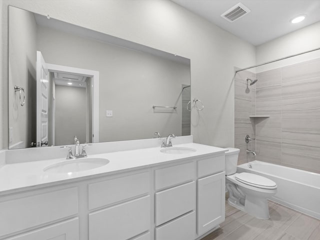 21703 White Bellflower Ln, Cypress, TX 77433 - bathroom featuring double vanity,  shower combination, and recessed lighting
