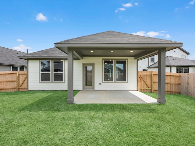 21703 White Bellflower Ln, Cypress, TX 77433 - rear view of property featuring a patio area, a fenced backyard, and a shingled roof