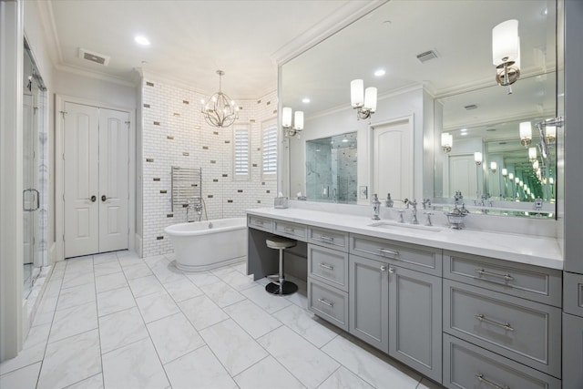 bathroom with crown molding, a stall shower, a notable chandelier, and visible vents