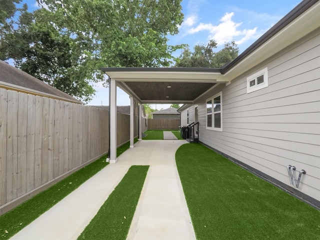 view of yard with a patio and a fenced backyard