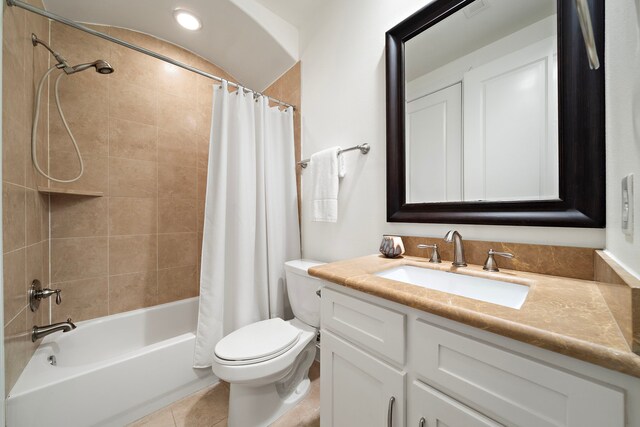 bathroom with vanity, tile patterned flooring, shower / bath combo with shower curtain, toilet, and recessed lighting