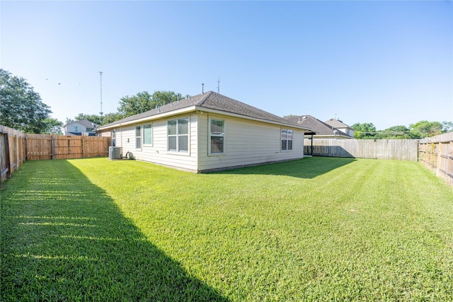 1409 Barras St, Alvin, TX 77511 - rear view of house with cooling unit