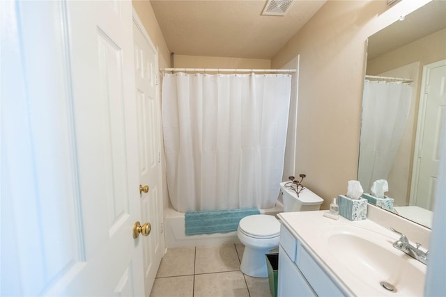 1409 Barras St, Alvin, TX 77511 - bathroom with tile patterned floors, vanity, toilet, and shower / bath combo