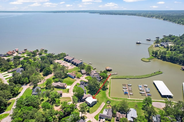 aerial view featuring a residential view and a water view