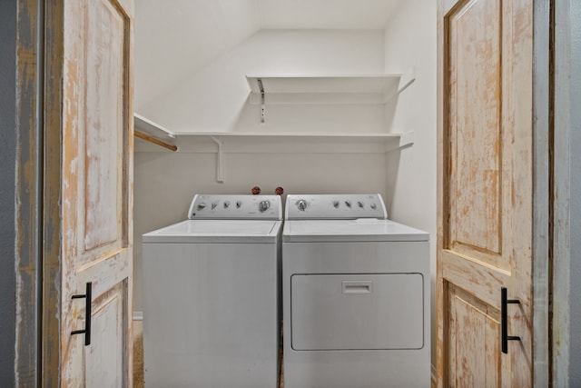 laundry room featuring independent washer and dryer and laundry area