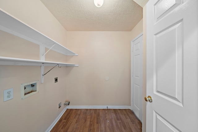 clothes washing area featuring baseboards, hookup for a washing machine, laundry area, hookup for an electric dryer, and dark wood-style floors