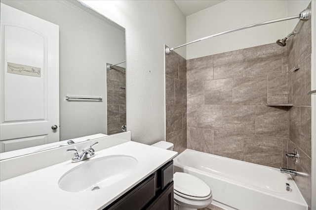 bathroom featuring vanity, toilet, and bathing tub / shower combination