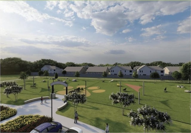view of property's community featuring a residential view and a yard