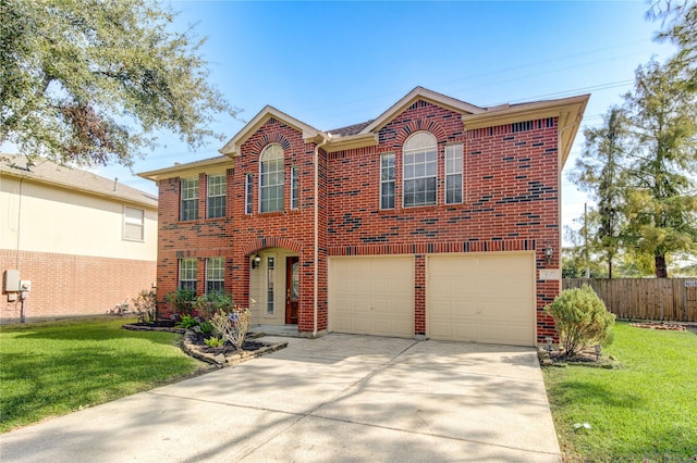 view of front facade featuring fence, an attached garage, driveway, and brick siding
