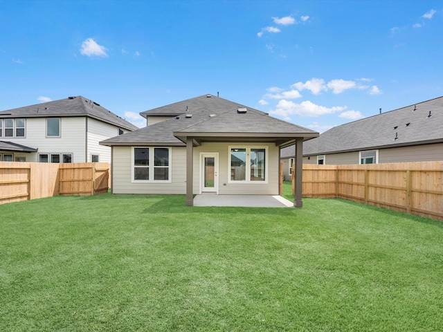 21711 White Bellflower Ln, Cypress, TX 77433 - back of house with a patio area, a fenced backyard, and a shingled roof