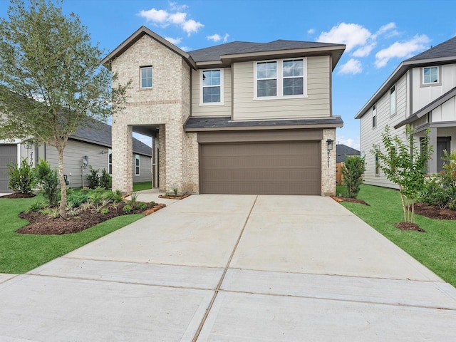 21711 White Bellflower Ln, Cypress, TX 77433 - view of front of home with brick siding, an attached garage, driveway, and a front yard