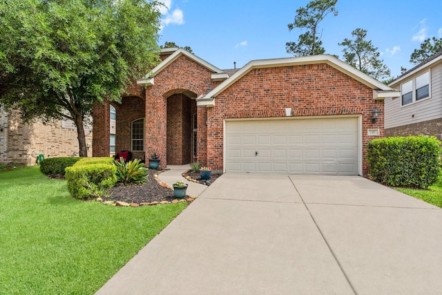 view of front of home featuring concrete driveway, a garage, brick siding, and a front yard