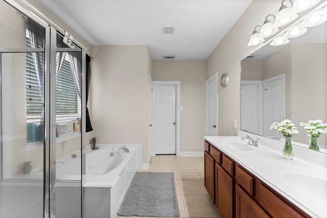 full bath with a bath, visible vents, tile patterned flooring, and a sink