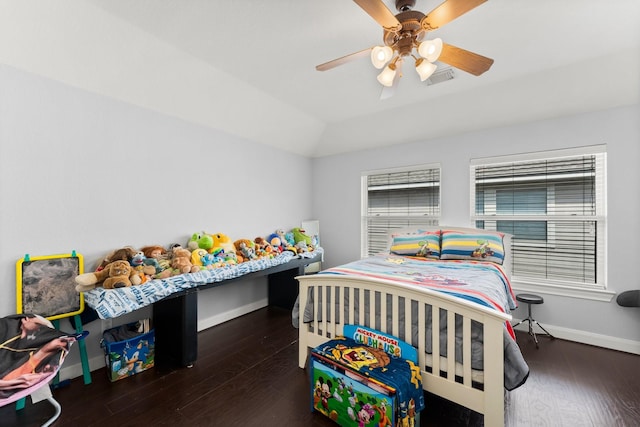 bedroom with vaulted ceiling, baseboards, a ceiling fan, and wood finished floors