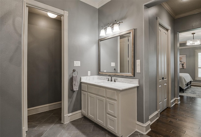 1330 Royal Sands Ln, Houston, TX 77345 - ensuite bathroom with crown molding, vanity, and baseboards