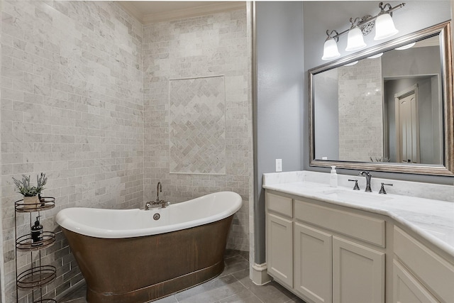 full bath featuring crown molding, tile patterned floors, a soaking tub, and vanity