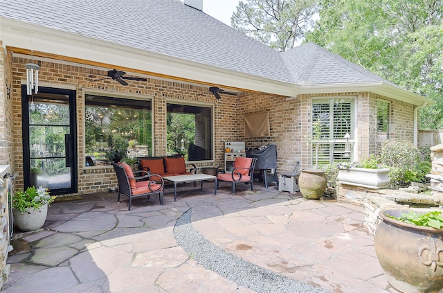 view of patio featuring ceiling fan and outdoor lounge area