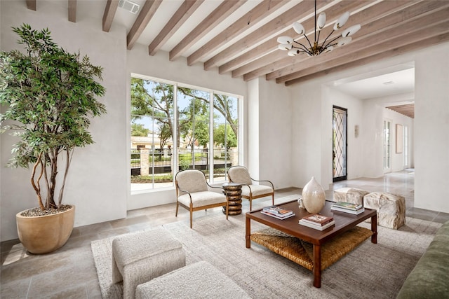 2525 Inwood Dr, Houston, TX 77019 - living area featuring beamed ceiling and a chandelier