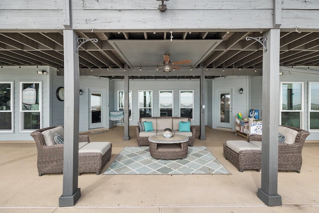 interior space with ceiling fan and an outdoor hangout area