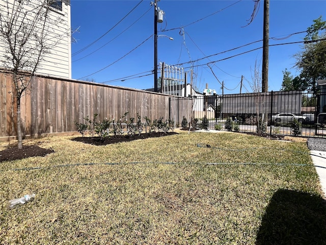 view of yard with fence