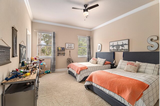 carpeted bedroom featuring multiple windows, ornamental molding, a ceiling fan, and baseboards