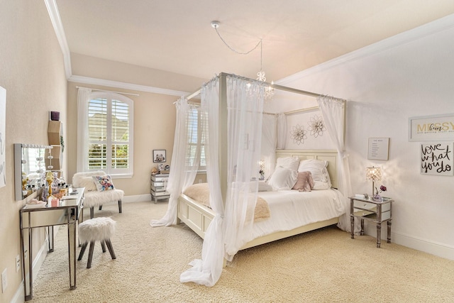 bedroom with carpet flooring, ornamental molding, baseboards, and a chandelier
