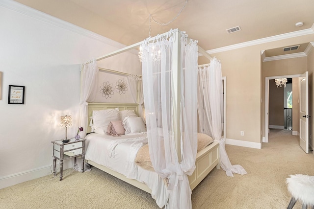 carpeted bedroom featuring crown molding and baseboards