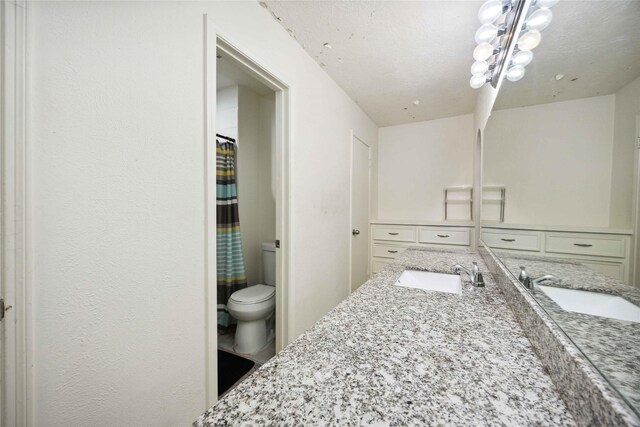 255 Shekel Ln, Houston, TX 77015 - bathroom with vanity and toilet
