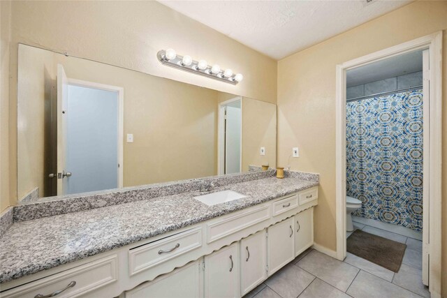 255 Shekel Ln, Houston, TX 77015 - bathroom featuring toilet, tile patterned floors, a shower with curtain, and vanity
