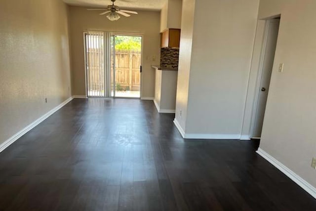 3600 Jeanetta St Unit 2502, Houston, TX 77063 - unfurnished room featuring a ceiling fan, dark wood finished floors, and baseboards