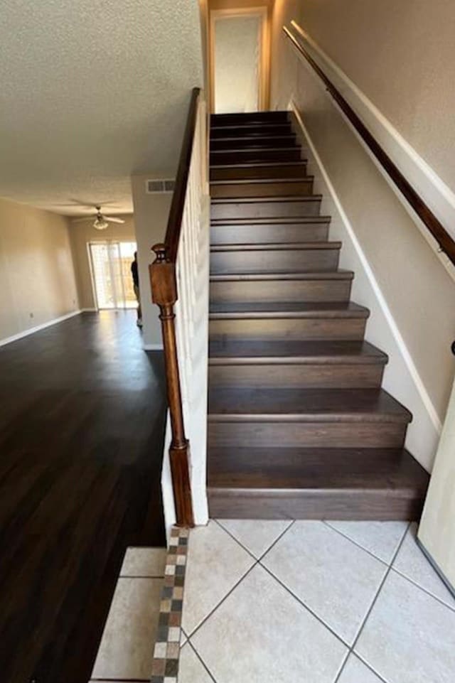 3600 Jeanetta St Unit 2502, Houston, TX 77063 - stairs with a ceiling fan, tile patterned flooring, and a textured ceiling