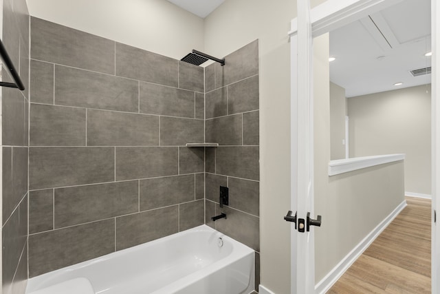 416 Stonework Landing Ln, Houston, TX 77076 - bathroom featuring shower / tub combination, visible vents, baseboards, recessed lighting, and wood finished floors