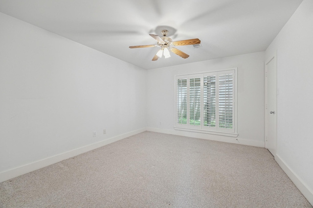 242 Knox St, Houston, TX 77007 - spare room featuring ceiling fan, carpet flooring, and baseboards